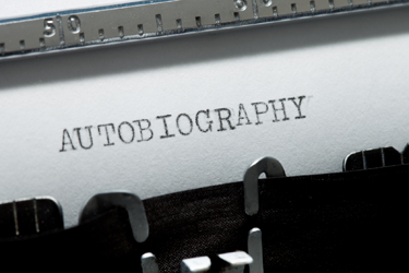 the word &lquo;Autobiography&rquo; in capital letters on a typewriter